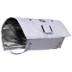 Gray portable grill with a lid. It has a charcoal basket inside.