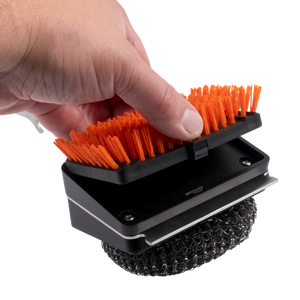 Black grill brush with stainless steel bristles. Ideal for cleaning barbecue grills.