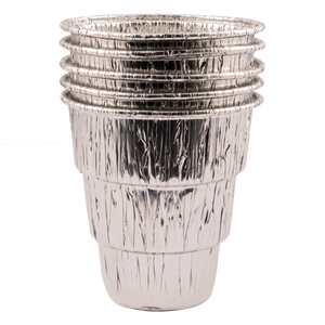 Silver aluminum foil cupcake liners stacked. Baking supplies for desserts.