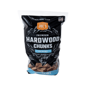 Dark brown hickory wood chunks. A bag of Kingsford brand. Used for smoking meat.