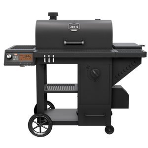 Black Weber Genesis E-310 gas grill. Stainless steel construction. Three burners. Control knobs visible.