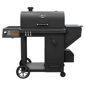 Black Weber Genesis E-310 gas grill. Stainless steel construction. Includes side burner and warming rack.