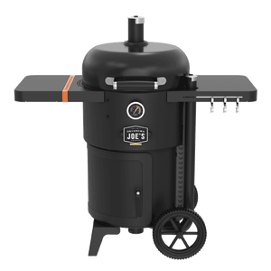 Black barrel charcoal grill with side shelves, hooks, wheels, and built-in thermometer. Accessible handle and sturdy design.