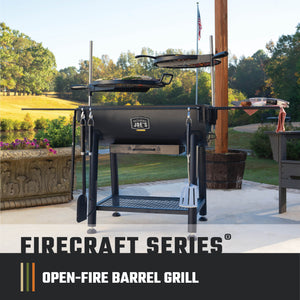 Black Weber Genesis E-310 gas grill on a patio. It has stainless steel side shelves.