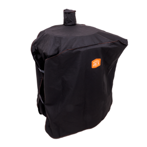 Black grill cover. Protects outdoor grills from weather. Durable, waterproof material.