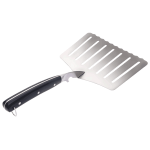 Wide stainless steel slotted spatula with black handle and hanging loop, ideal for flipping large foods.