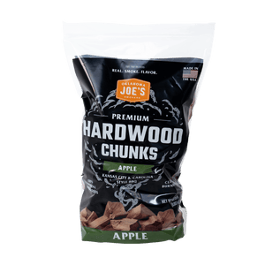 Brown hickory wood chunks in a clear bag. Kansas City brand logo visible.
